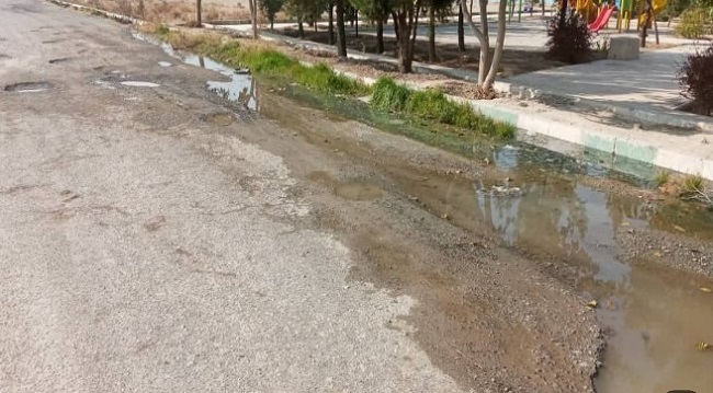 آب گرفتگی خیابان و آسفالت آسیب دیده آب گرفتگی خیابان و آسفالت آسیب دیده
